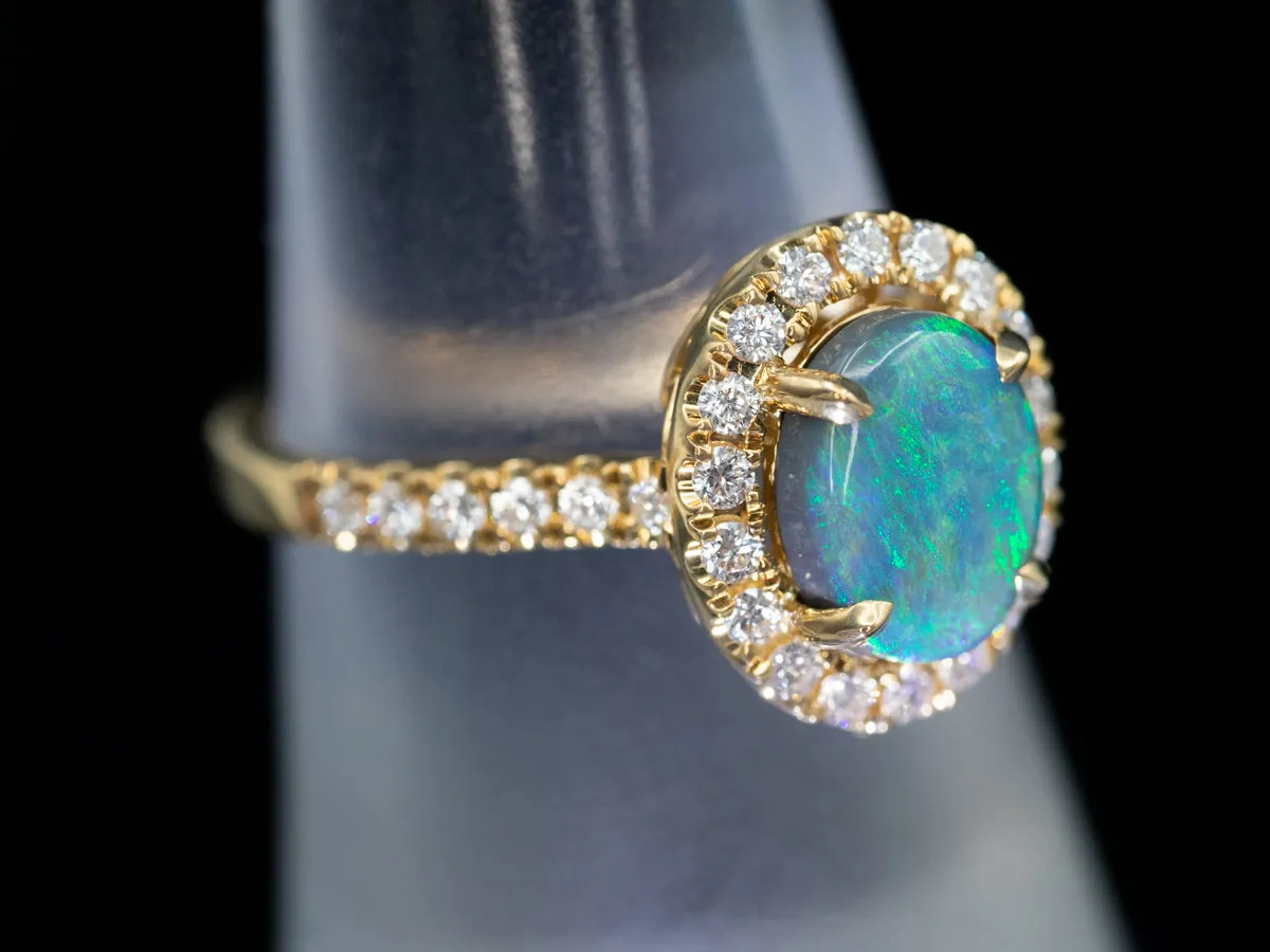 18K Yellow Gold Black Opal Oval and Diamond Halo Ring