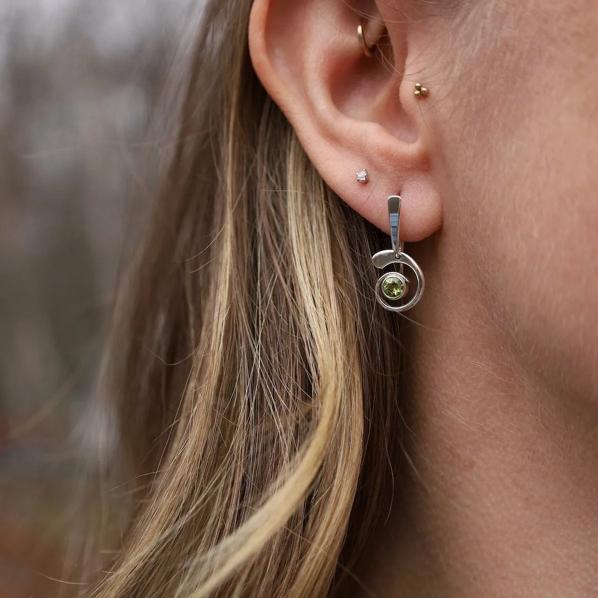 Faceted Peridot Nautilus Earrings